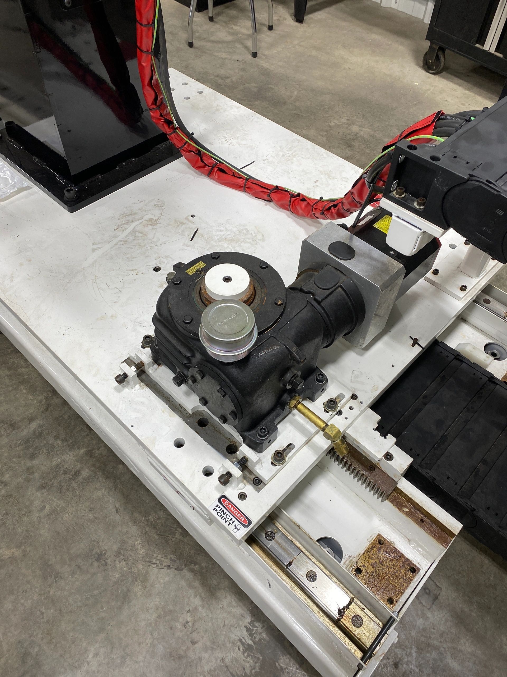 Welding robot being checked in the Rice Automation shop