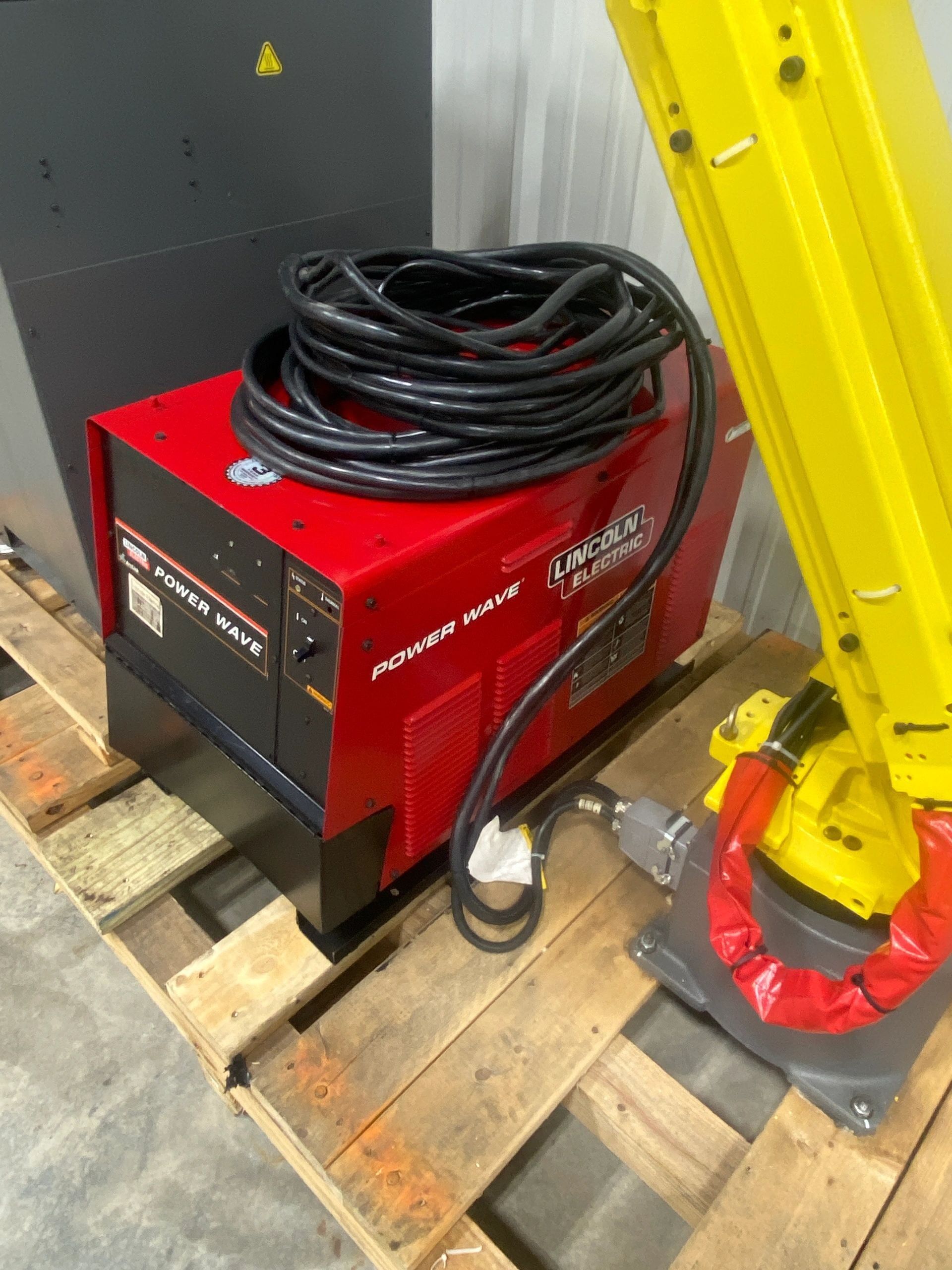 Fixture and cell work for a Fanuc welding robot at Rice Automation